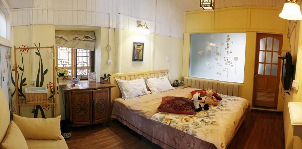 Tree'S Tale Hotel - Lijiang Лицзян Экстерьер фото